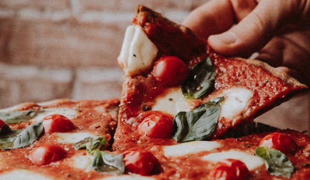 A delicious pizza being prepared